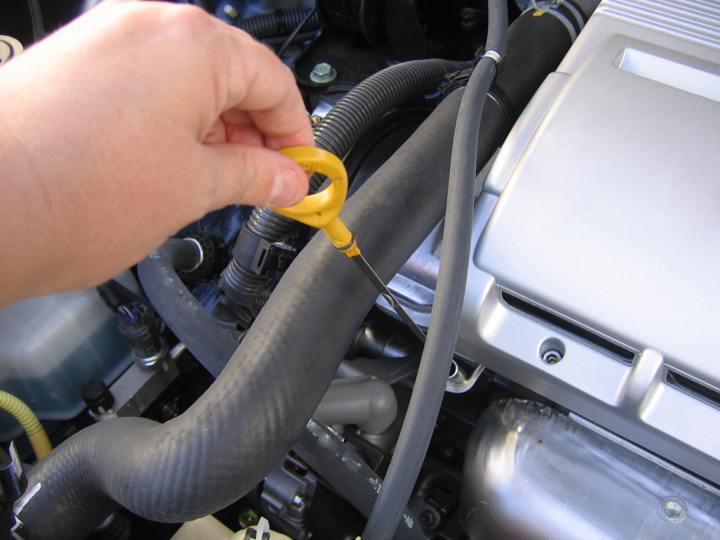 pulling-out-dipstick